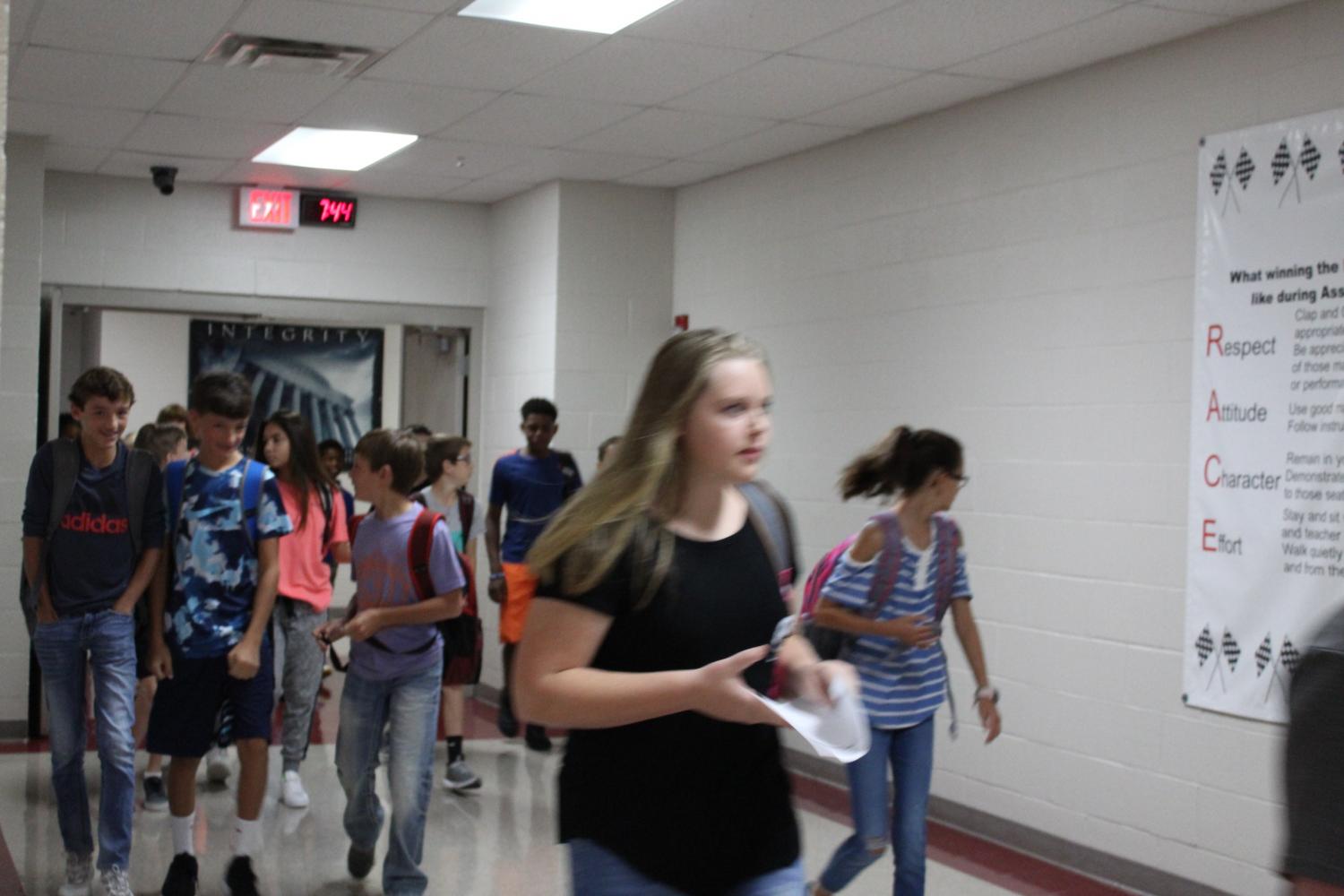 Students walk to class Thursday morning for the second day of school.