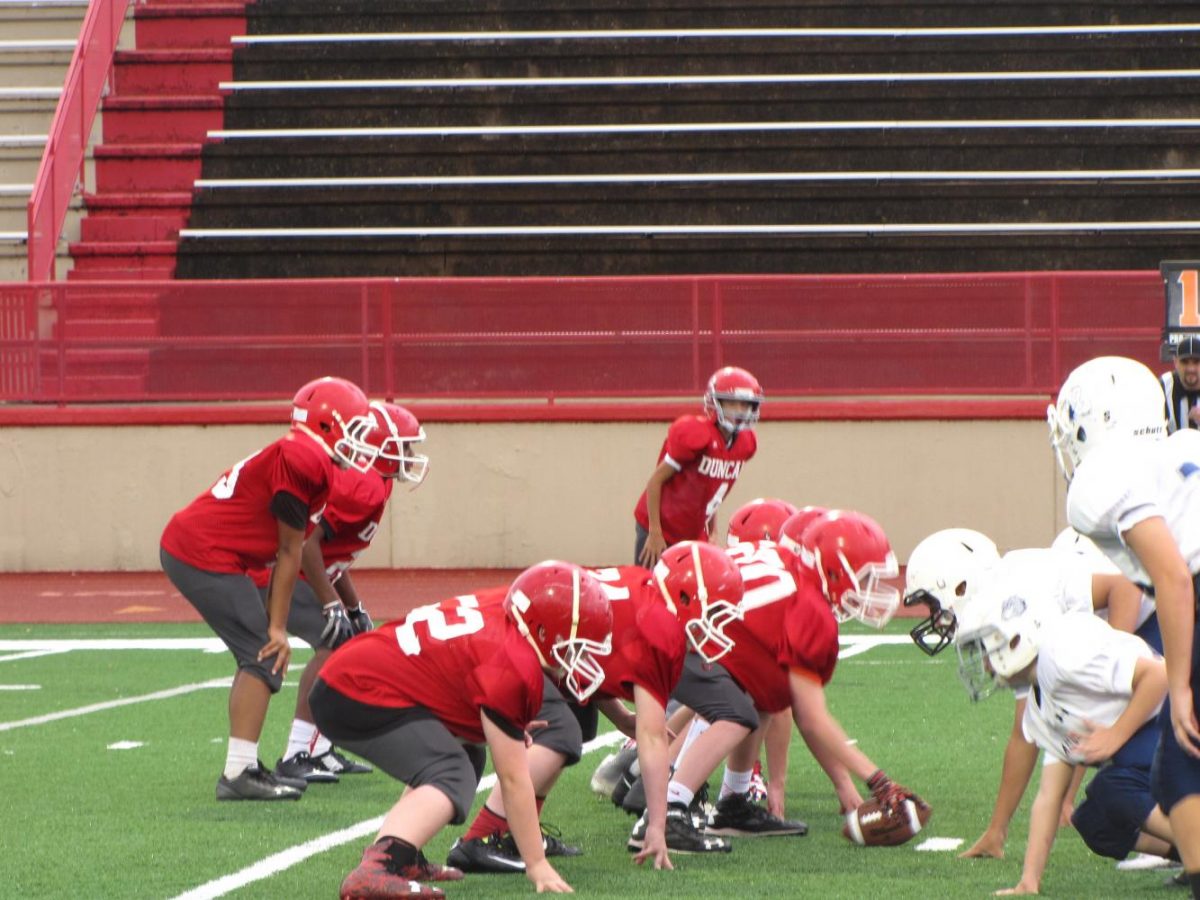 DMS eighth-grades football team faces off against the Altus Bulldogs.