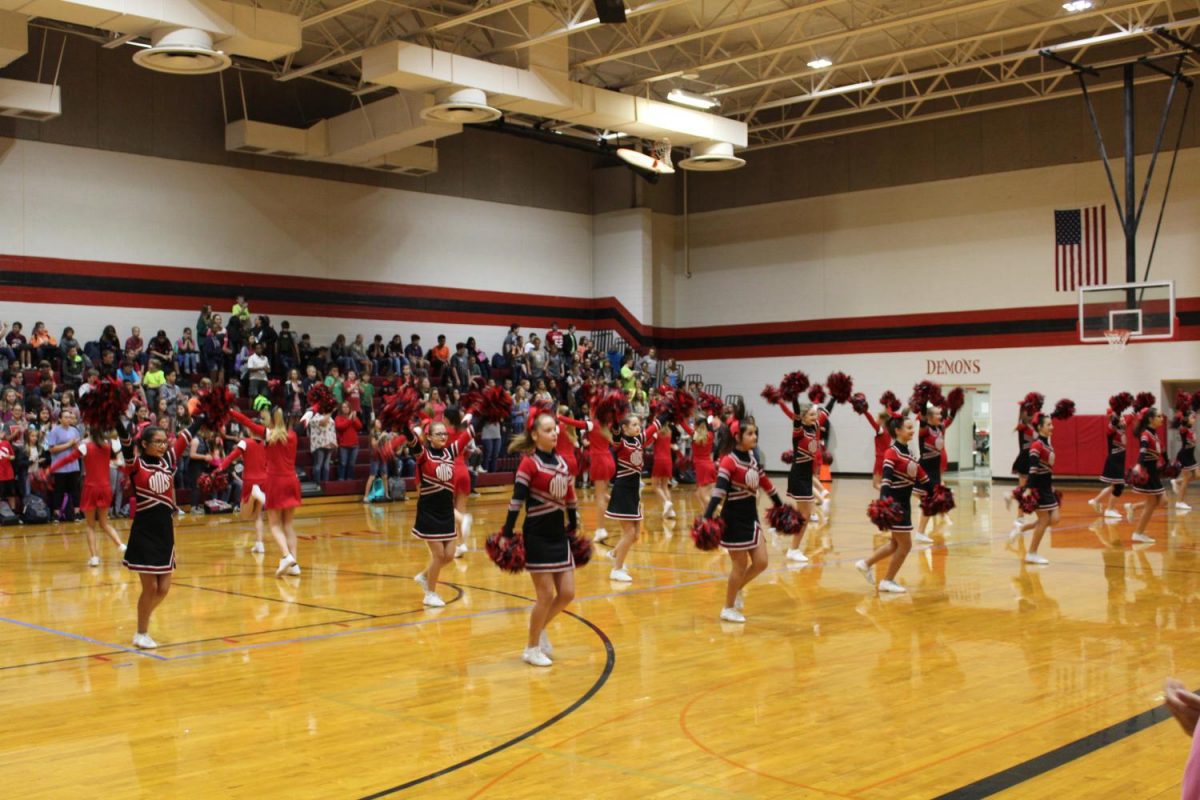 Duncan Middle School cheerleaders perform as part of todays pep rally.