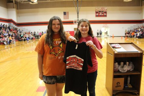 Sadi Blalock and Addison Siess, along with Gracie Reid, were recognized Thursday for being good representatives of the school theme, We rise by lifting others. The girls paid the Chromebook fee for another student.