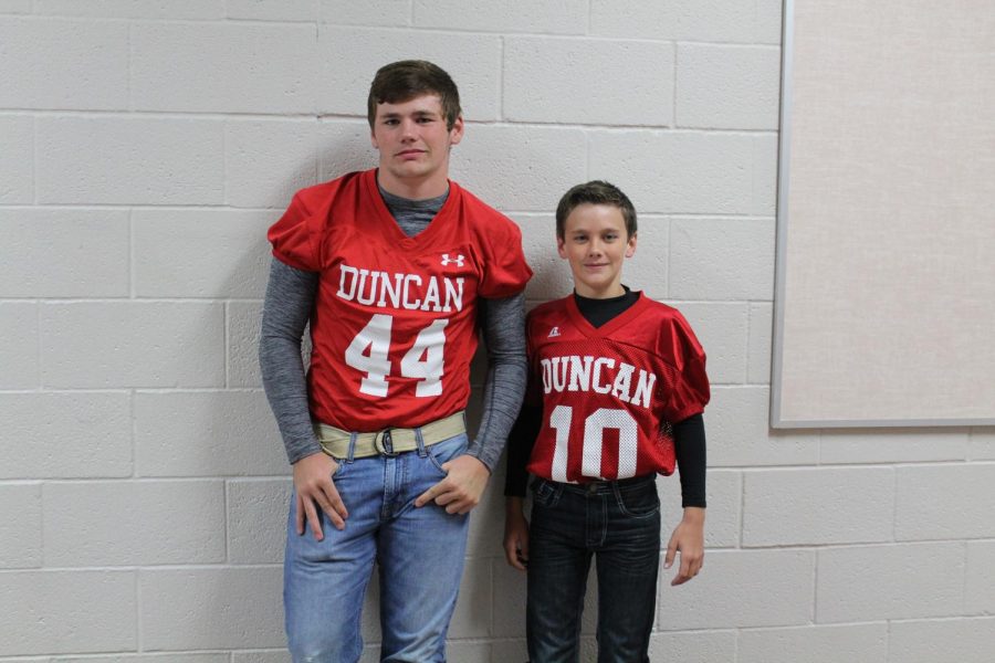 Brothers Anthony and Mathew Smiddy are ready for their last football game of the school year.