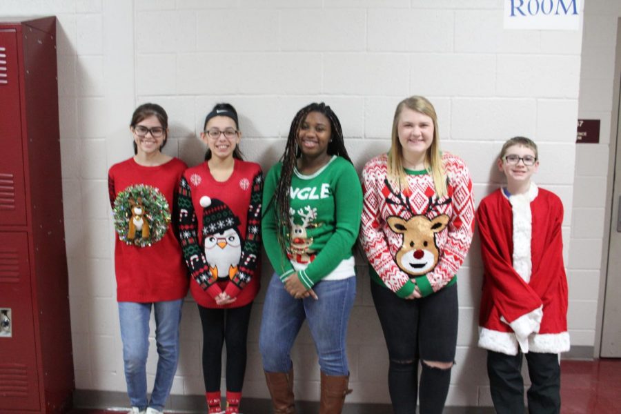 Seventh-grade students show off their ugly Christmas sweaters today. The students included Madison Thomas, Rylee Arrington, Ty-Ceana Smith, Fayln Durbin and Gavin Patterson.