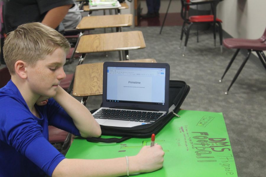 Sixth-grader Gage Puckett uses his Chromebook on Thursday to work on a class project. Internet access went down Wednesday morning, but returned by the end of the day.
