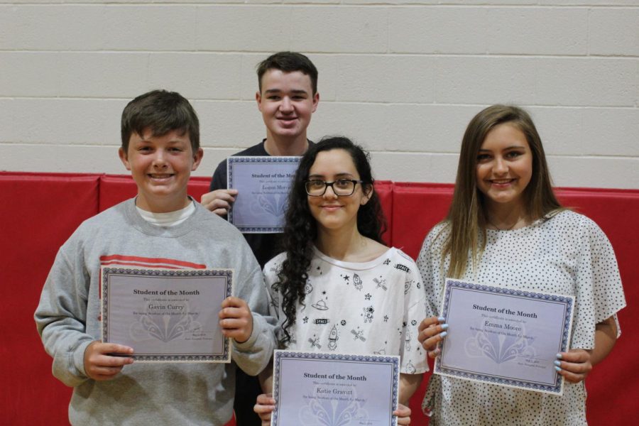 Eighth-graders Gavin Curry, Logan Morris, Katie Gravitt and Emma Moore were honored as the March students of the month.