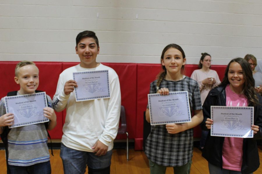 Sxith-graders Lucas Eaton, Michael Barham, Anastasia Scott and Alyssa Harvey were the April students of the month.