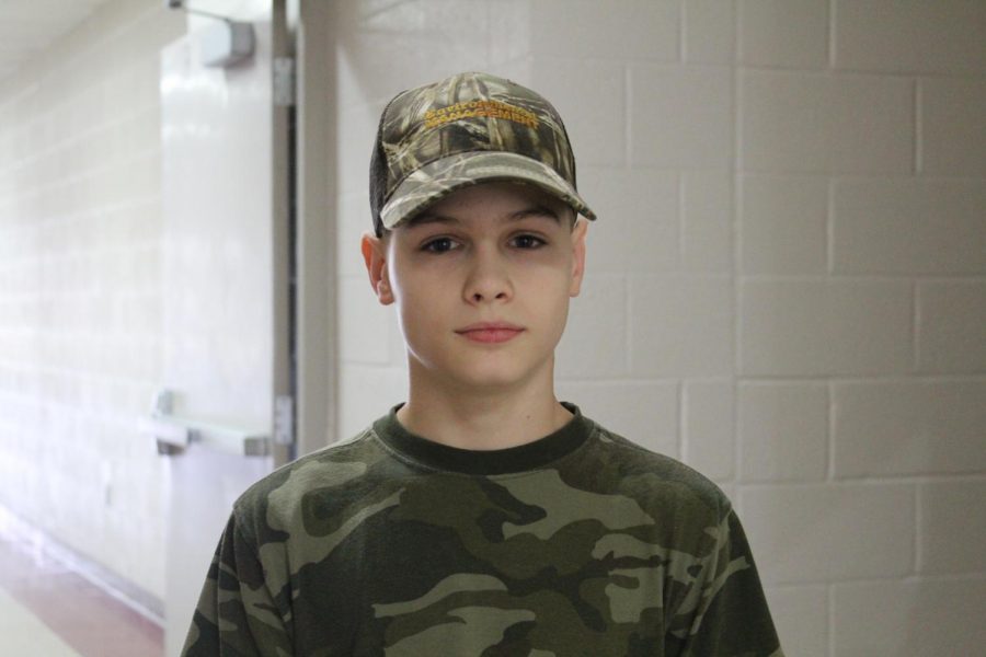 Cody Ramsey poses in his best camouflage for Camo Day.
