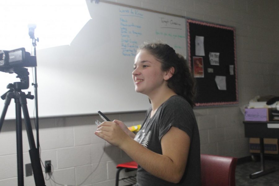 Maddie Caldwell records a segment of the latest DMS News Update.