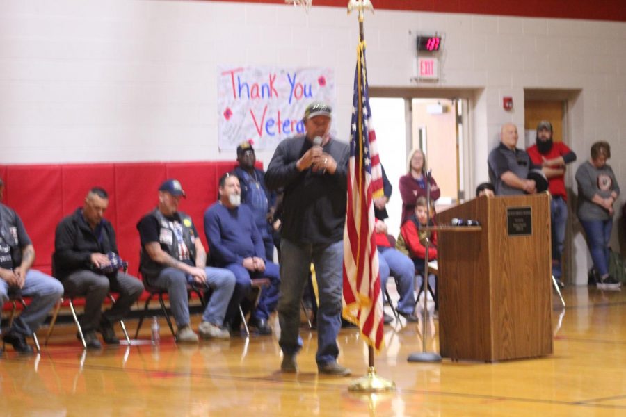 A banner was added to the background of the Veterans Day assembly.