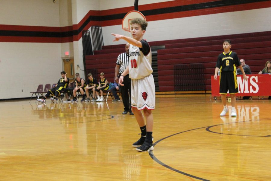 Ethan Coskrey plays in Tuesdays eighth-grade game.