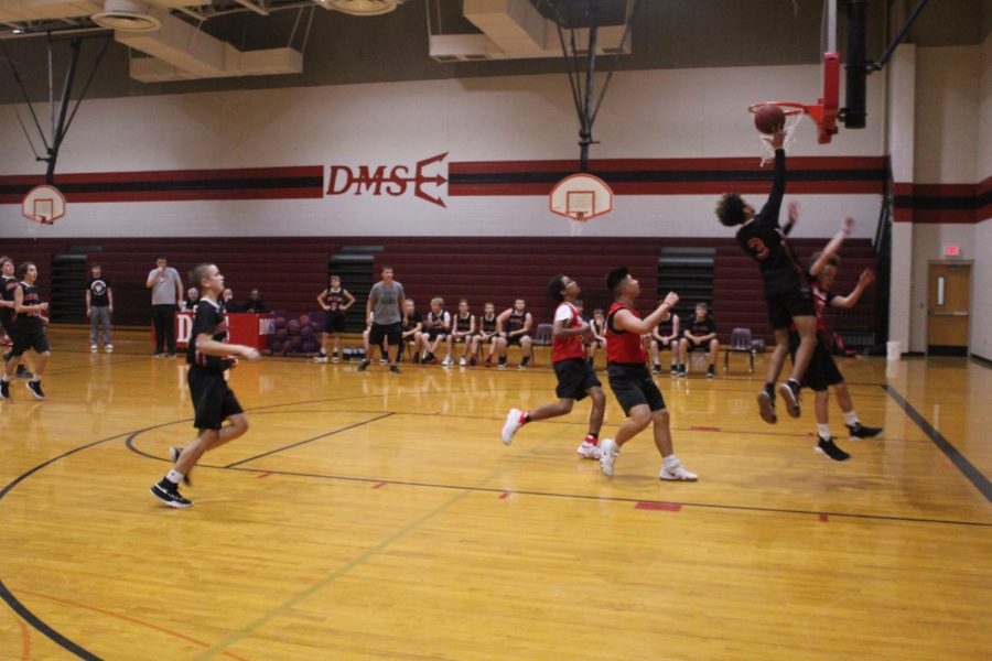 The eighth-grade basketball team plays in a scrimmage against Rush Springs.