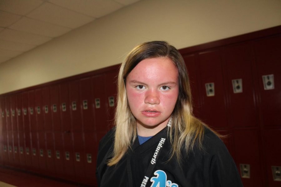 Bree Qualls shows off her sun and wind burns, following the first track meet of the season.