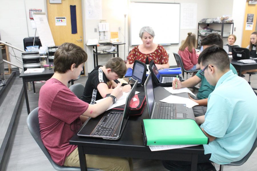 STEM teacher Rosie Castle works with students second hour today.