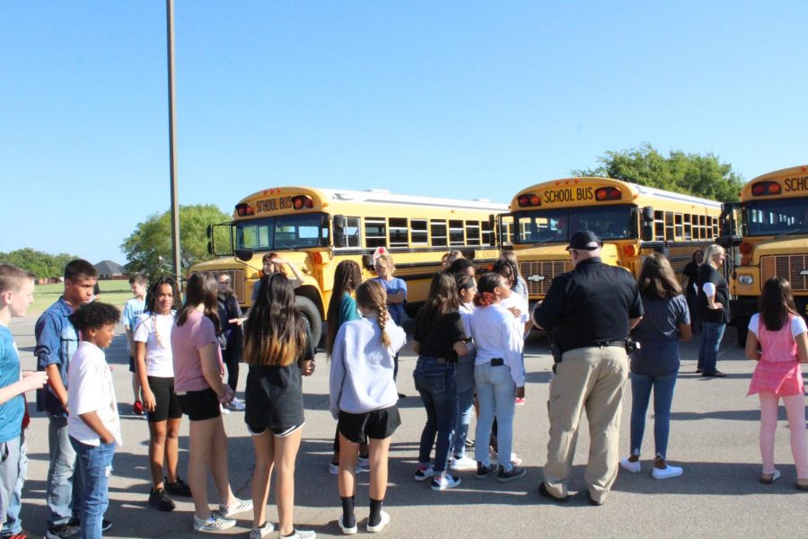DMS students participate in the bus evacuation drill