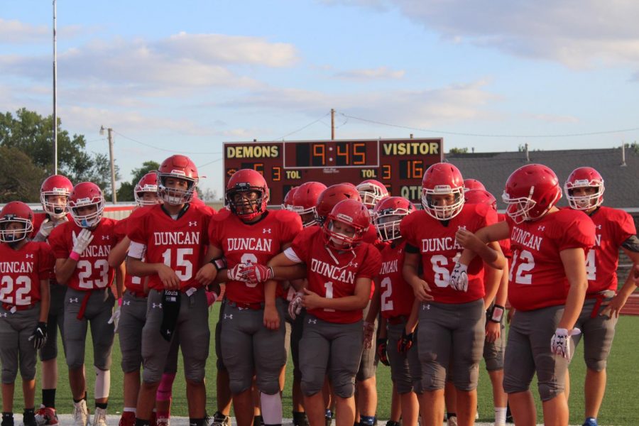 Football players prepare to defeat Altus.