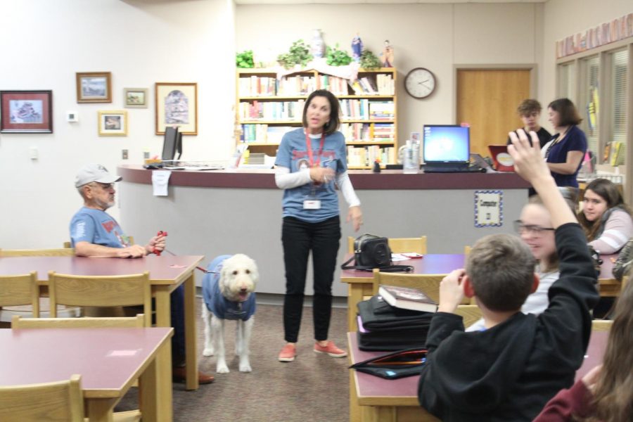Patti Whitaker talks about Bark in the Park with sixth-grade students.