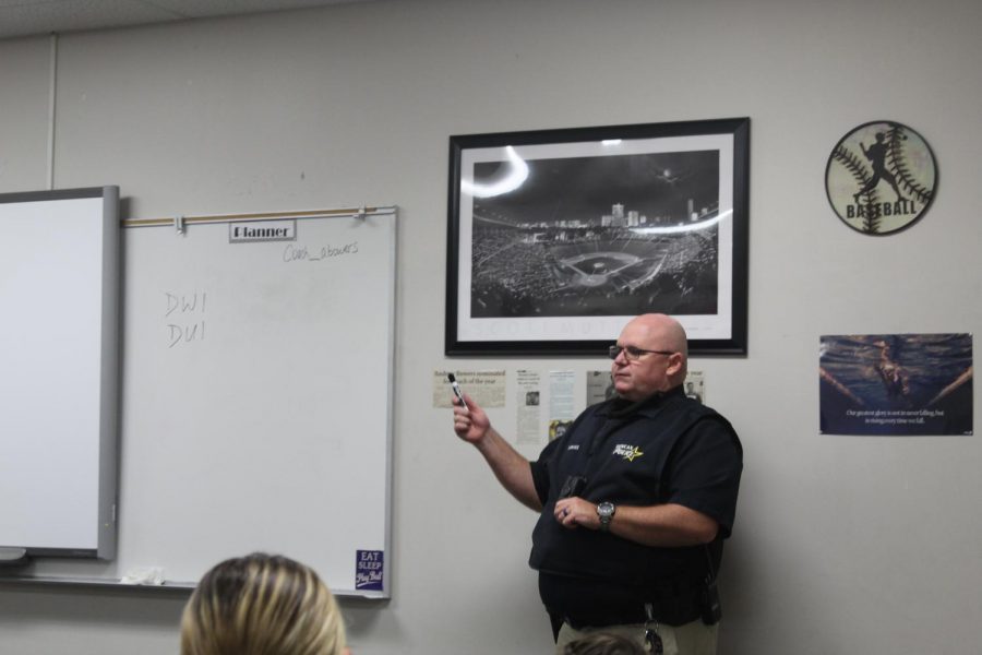 Officer Chris Perkins serves as a guest speaker for the health classes.