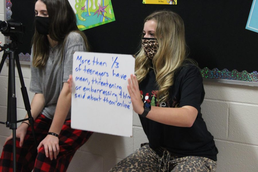 Breckyn Root and Emma Evans film a skit for Anti-Bullying Week.