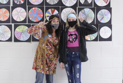 Shelly Farrar and Riley Miller dress in their hippie best for Red Ribbon Week.