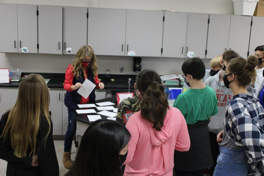 Stacy Smith talks to sixth-grade students during Education Station on Friday.
