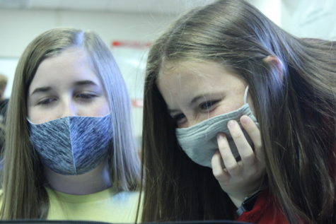 Katelyn Young and Sydney Miller wear masks during newspaper class. Duncan Public Schools passed a mask mandate before the start of the school year in response to the COVID-19 pandemic.