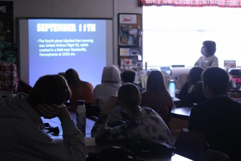 Cathy Barker teaches about 9/11 in her humanities class. Many DMS teachers have stories about where they were when the attacks occurred.