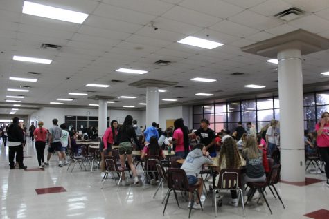 Eighth-grade students prepare to line up for lunch during their typical lunch period.