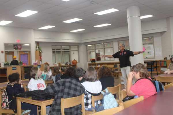 David Alston leads a history club meeting.