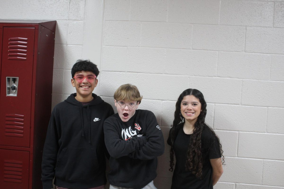 Seventh-grade students choose black over pink during the Barbieheimer dress-up day during the Winter Homecoming Week.