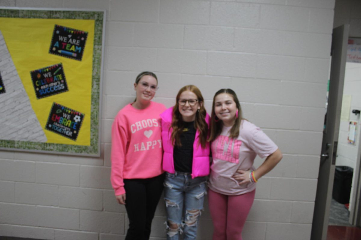 Eighth-graders participate in the Barbie vs. Oppenheimer dress-up day.