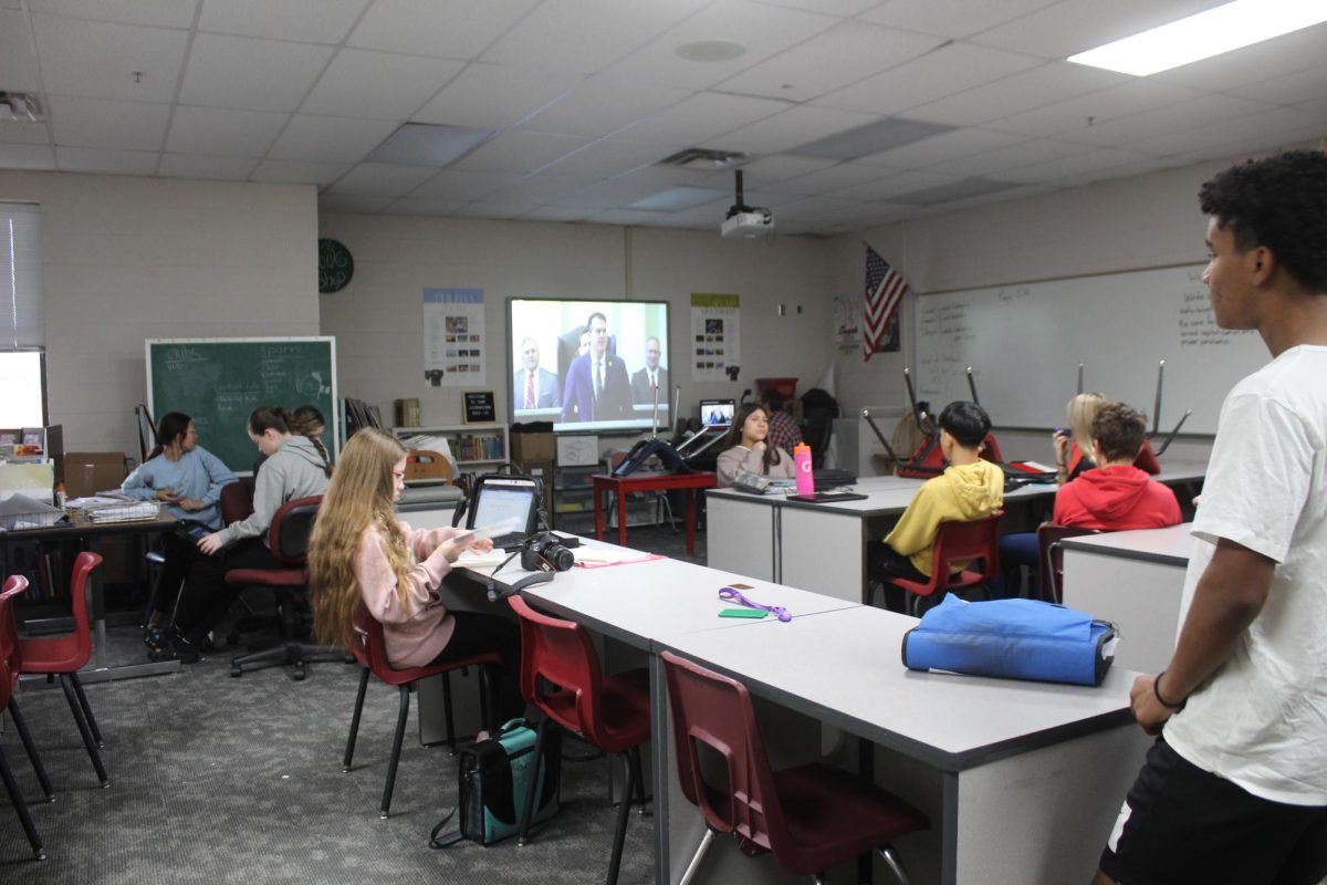 Students in the DMS newspaper class watch the Oklahoma State of the State Address.