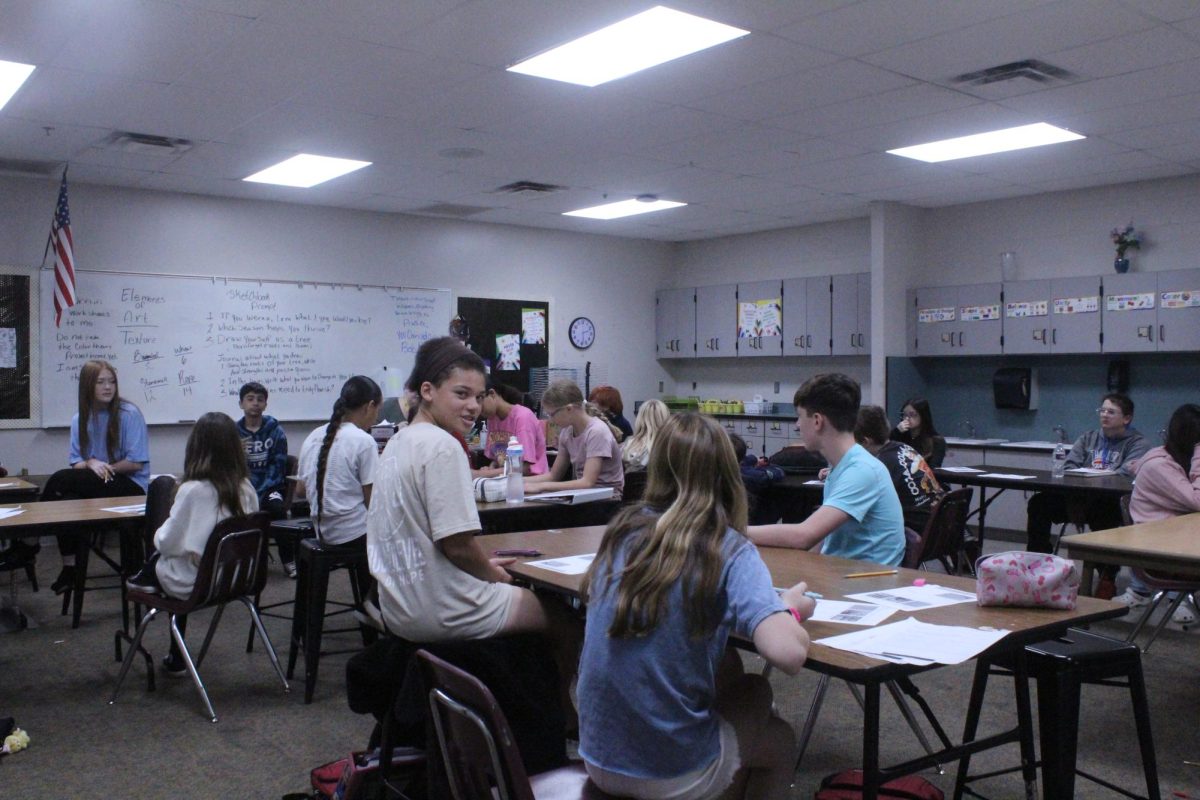 Students work on projects in Nikki Reid's art class. Reid is one of several new teachers to DMS this year.