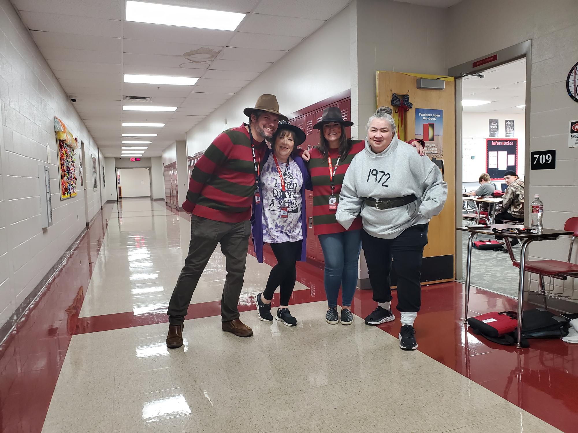 Duncan Middle School teachers, from left, Derrick Miller, Cathy Barker, Whitney Gdanski and Sally Wheeler dress up for Favorite Movie Character Day, as part of Red Ribbon Week. The dress-up day coincided with Halloween.