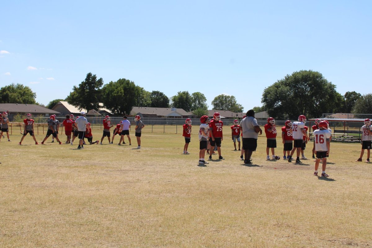 Football players practicing