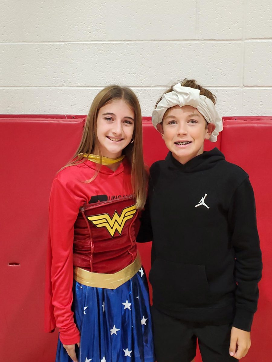 Peyton Williams and Parker Sanders show off their mock election characters.