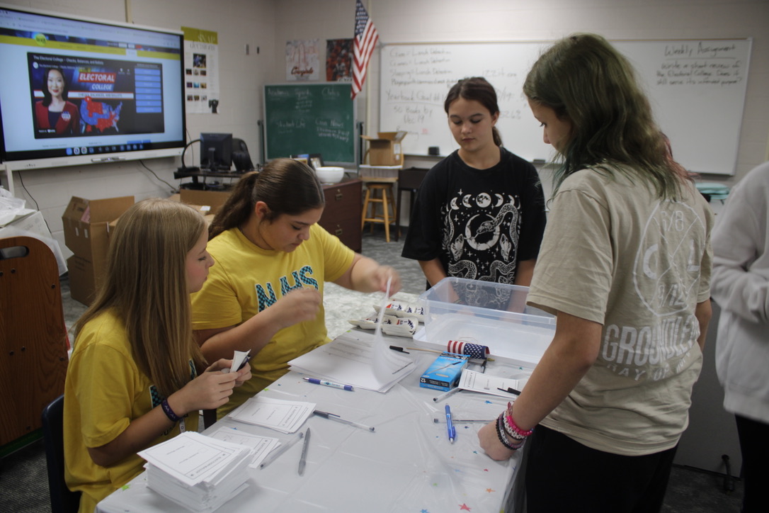 Seventh-grader Summer Williams prepares to vote during the Duncan Middle School mock election on Nov. 5.