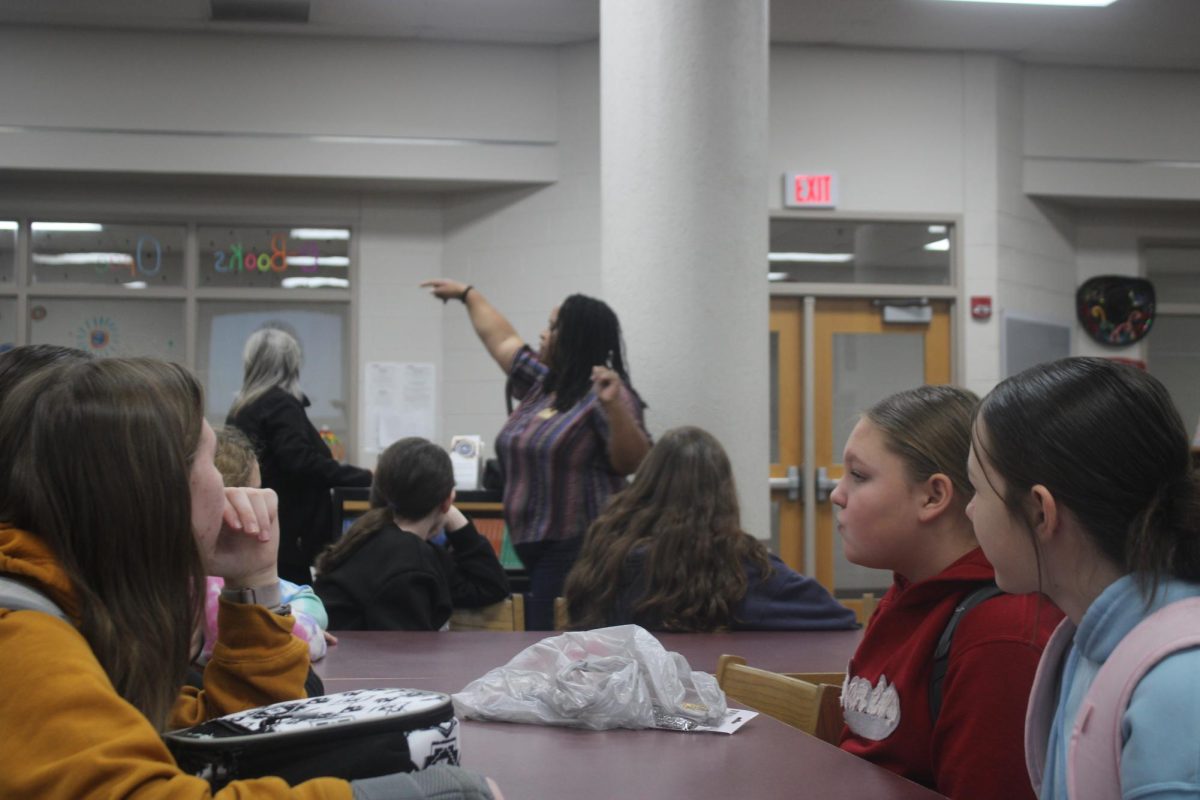 Seventh-grade students listen to information about the newly founded Pathways Youth Coalition at Duncan Middle School.