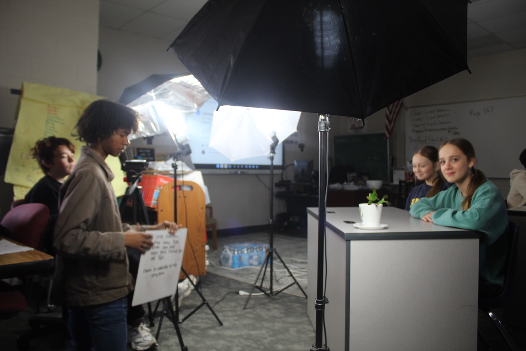 Ady Cook and Emma Boyd prepare to give the weekly video news update.