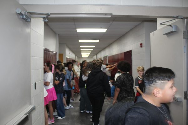 Sixth-grade students move through the hallways on the first day of school, which was Aug. 14.