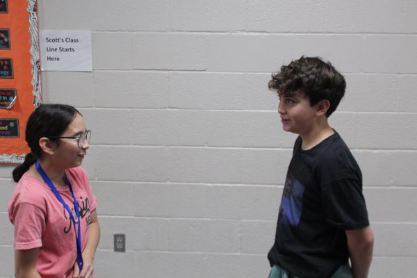 Sports Editor Carleigh Nalley interviews swimmer Bentley McNinn.