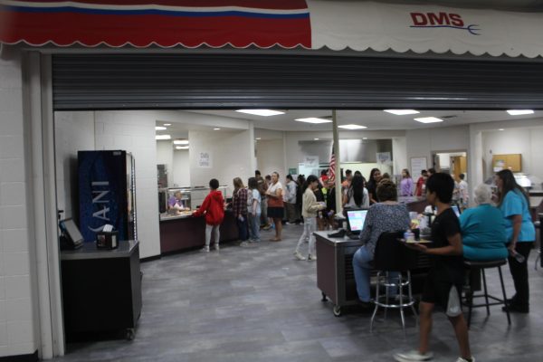 DMS students go through the breakfast line before school. This year, the school district is supplying free breakfasts and lunches.
