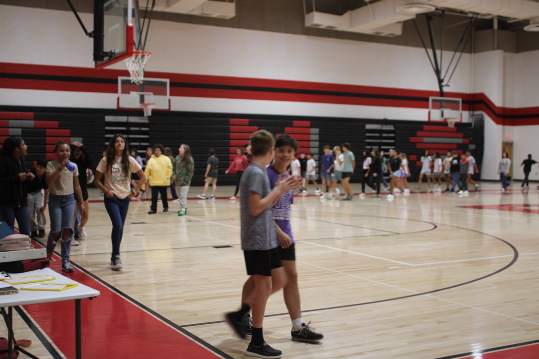 Students walk during PE as part of their class curriculum.