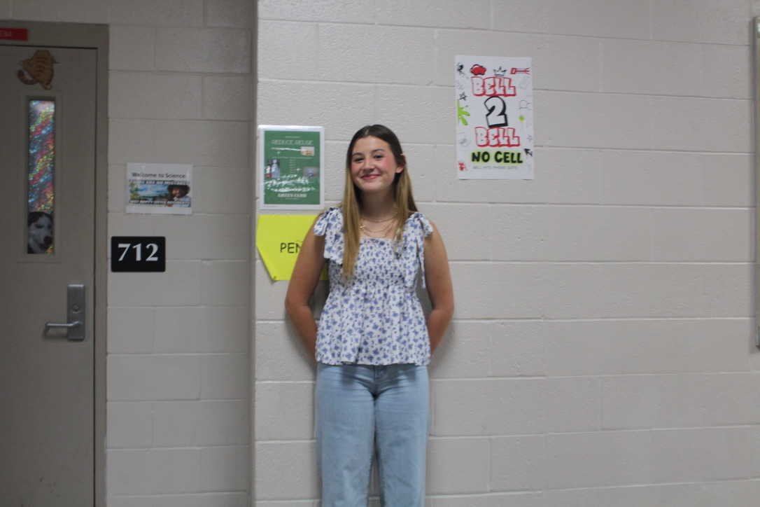 Zabry Ross poses for a photo after being interviewed about softball.