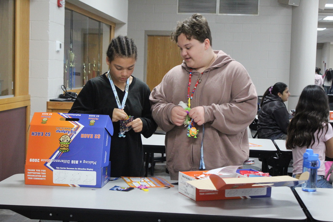 DMS seventh-grade students looks through their chocolate boxes at the start of the school-wide fundrasiser.