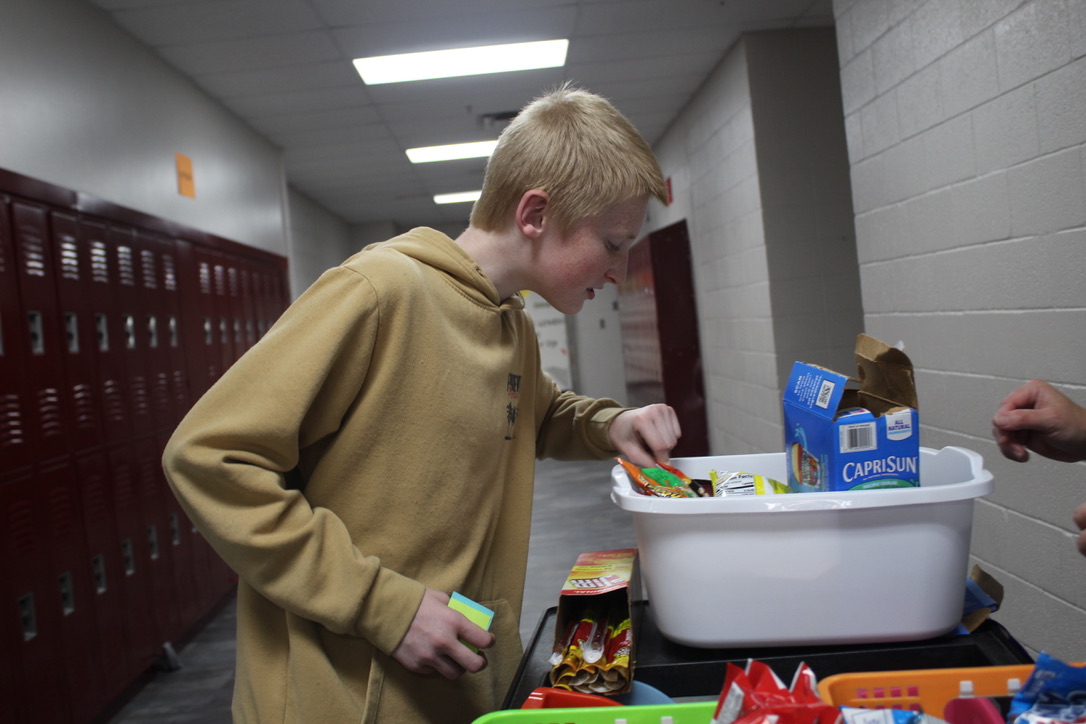 Ryan Brown looks at the food items on the Crunch Wagon.