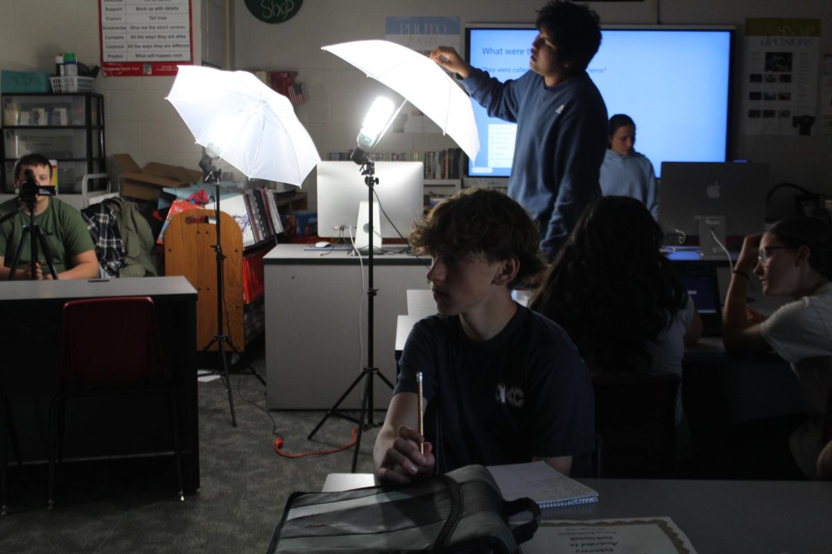 The Demon Direct staff prepares for the weekly News Update.