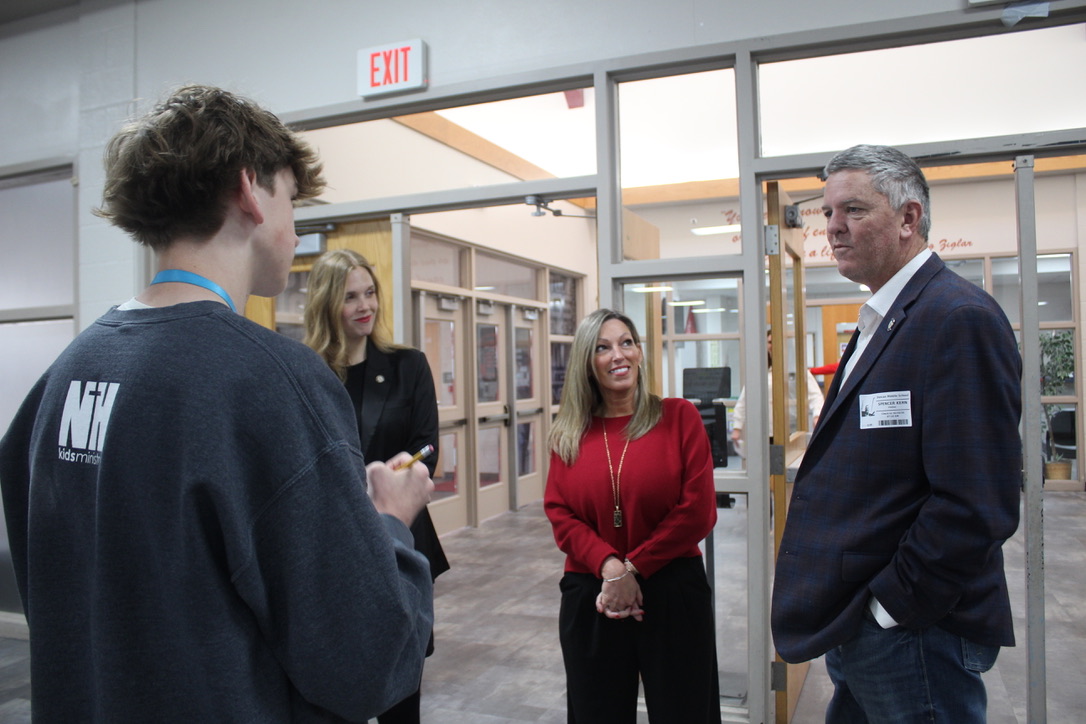 Sports editor Zack Ottwell interviews state legislators, following the ADE Legislative Breakfast.