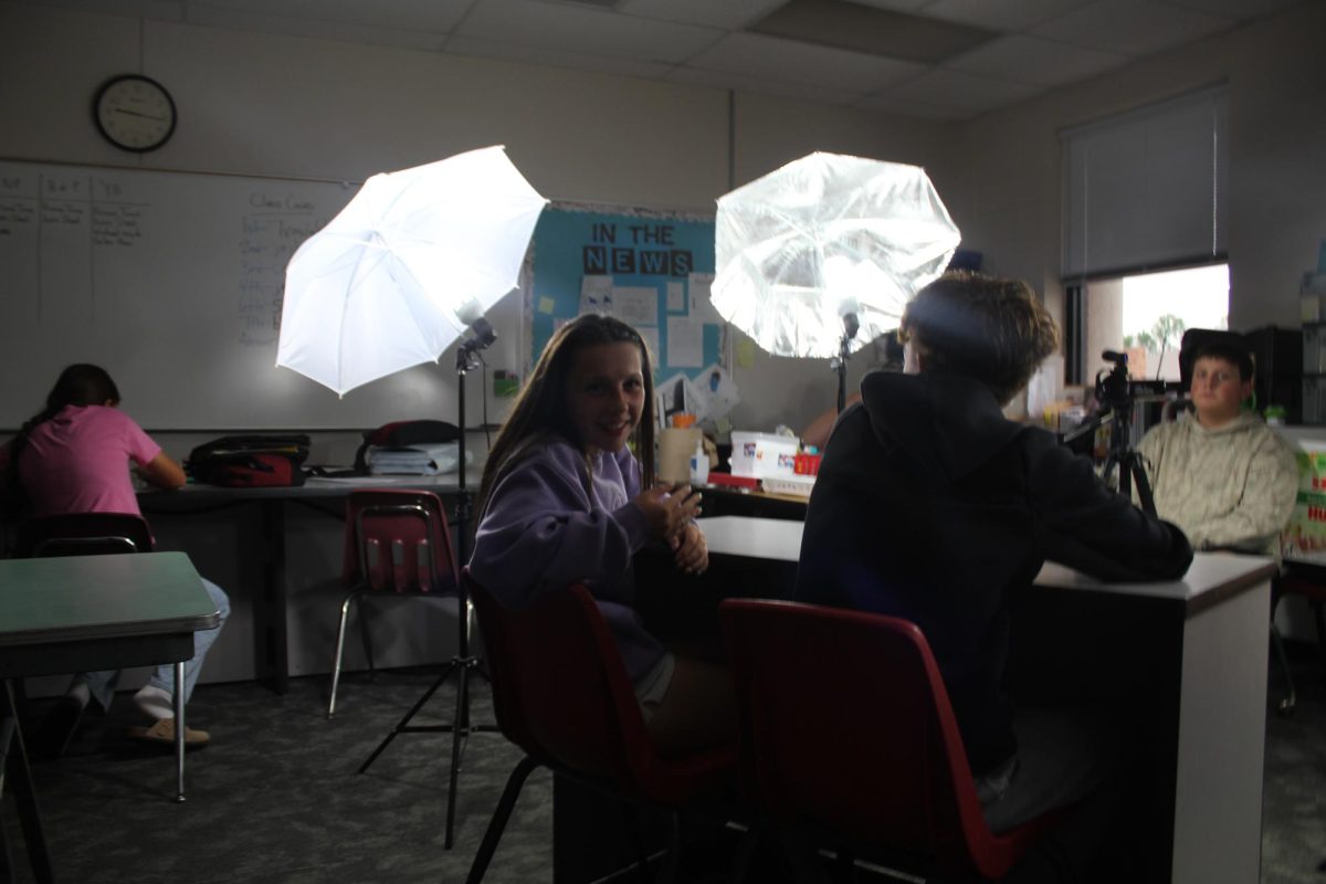 Lillie Goble and Wyatt Patterson prepare for this week's video News Update, as they wait for the completed script.