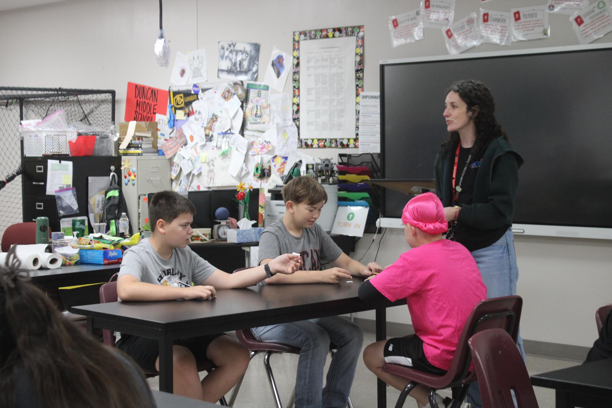 Renea Lawler leads a game with her students.